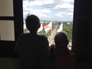 Kids look at memorial in Santiago and remember sacrifice and suffering.  Thank you Lord for your mercy and grace.